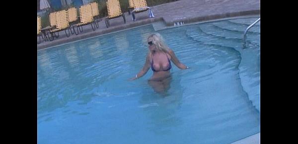  Brazzer Blonde shows her beautiful TITS in a PUBLIC POOL